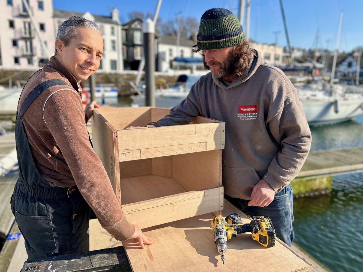 Franky and Rob building the worktop on the pontoon