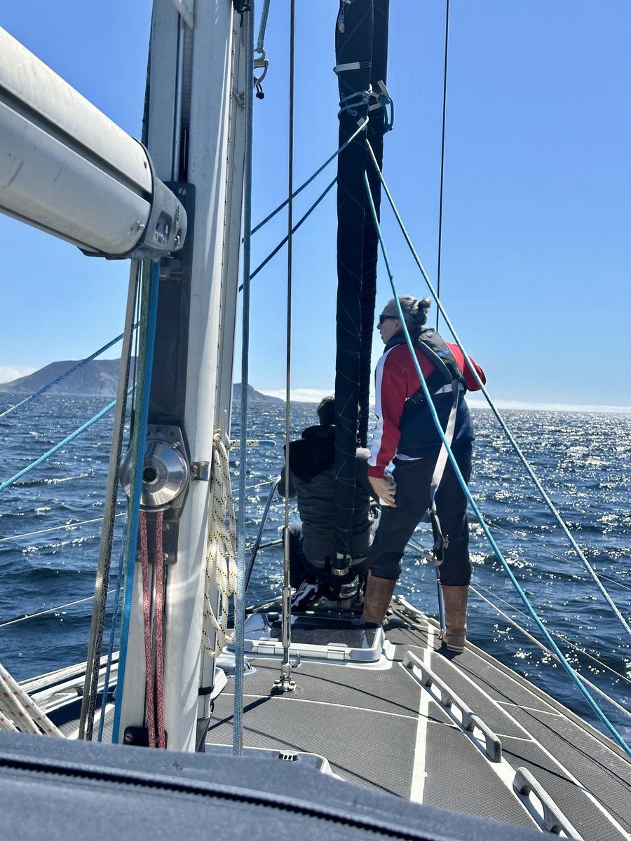 Rob and Valentin at the headsail furler on the bow