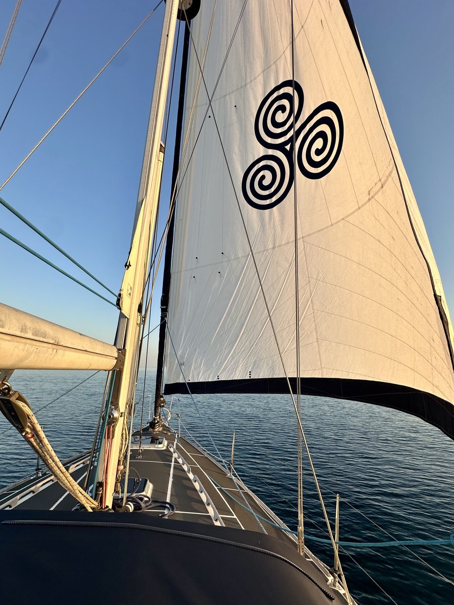 Lagertha's mainsail with triskelion in golden hour light