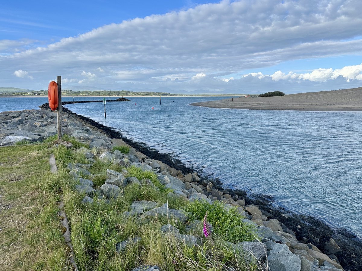 Pwllheli harbour entrance - breakwater, channel markers and navigational buoys