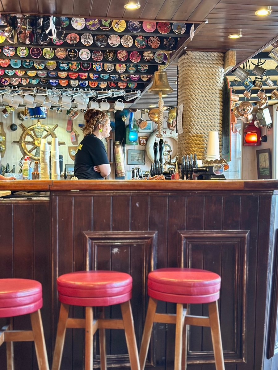 Inside the Ty Coch Inn - nautical decor and beer-mat ceiling