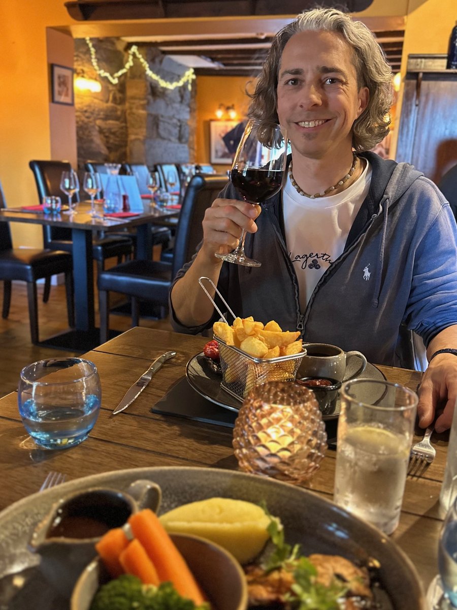 Rob toasting with red wine at Yr Hen Fecws