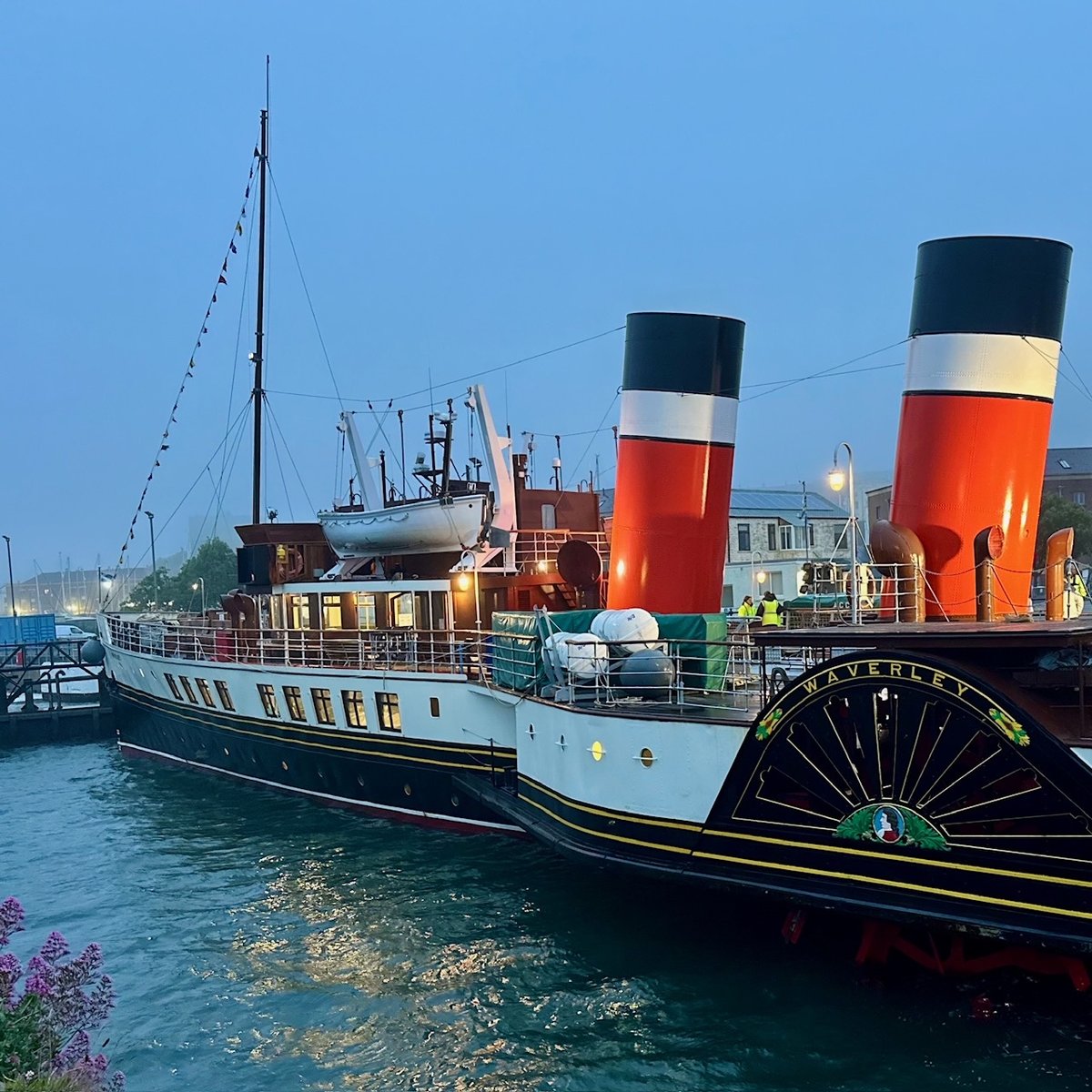 PS Waverley paddle steamer docked at Milford Haven under twilight sky