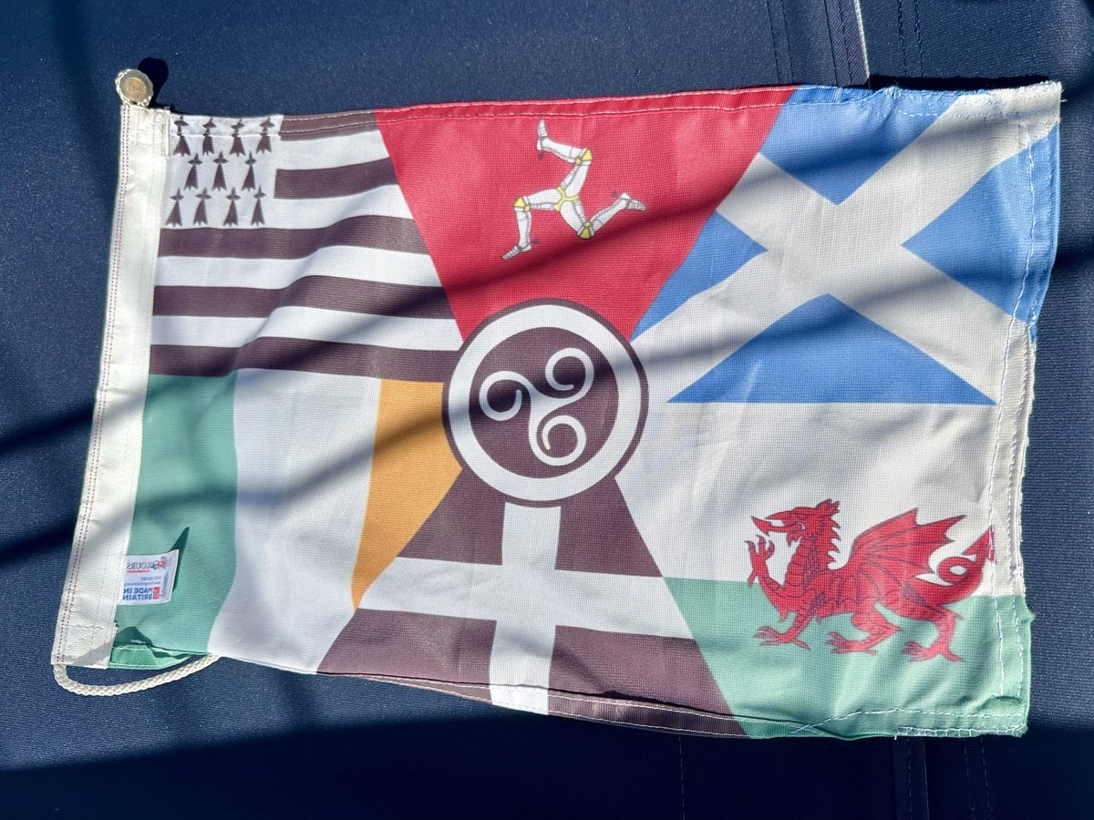 Mended Celtic guest flag - the flag of Brittany flying from the rigging