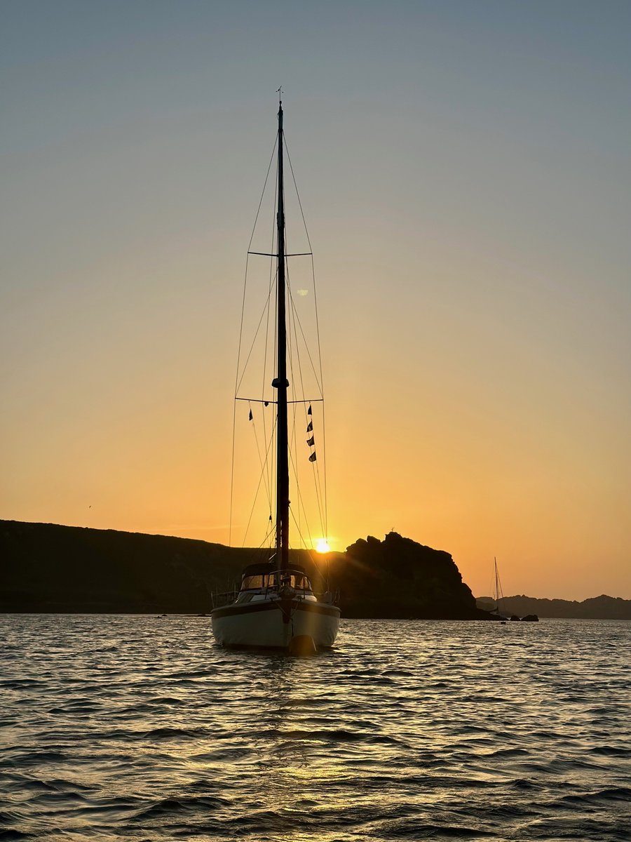 Sunset at Old Grimsby - sailboat silhouetted against golden sky