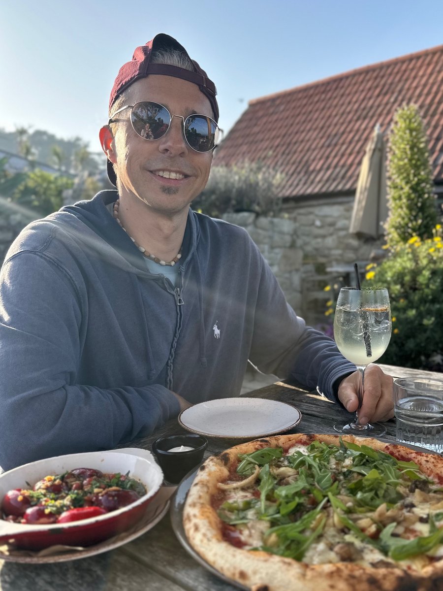 Dinner at the Ruin Beach Cafe - Rob with pizza and salad