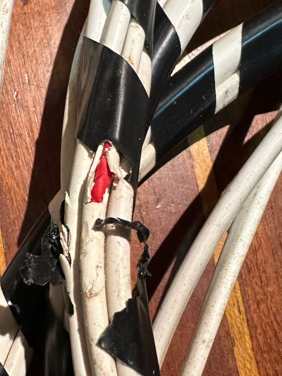 Cracked insulation exposing inner conductors