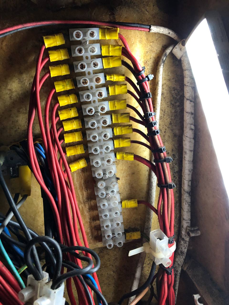 Old corroded chocolate block terminals - note the melted plastic