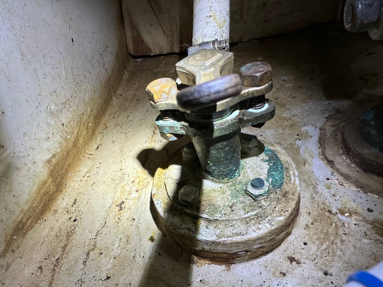 Old flanged seacock with heavy verdigris and corrosion