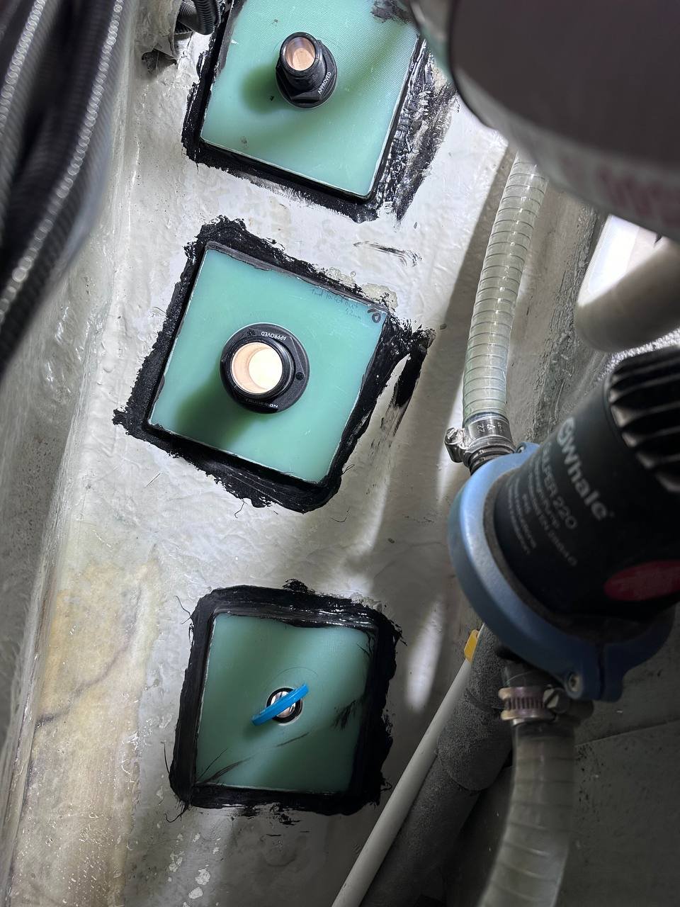 New composite backing block bonded to the hull interior