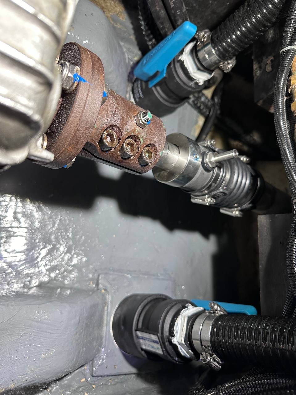 Old corroded seacock next to new Trudesign valve - before and after in the same bilge space